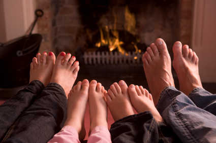 family feet fireplace